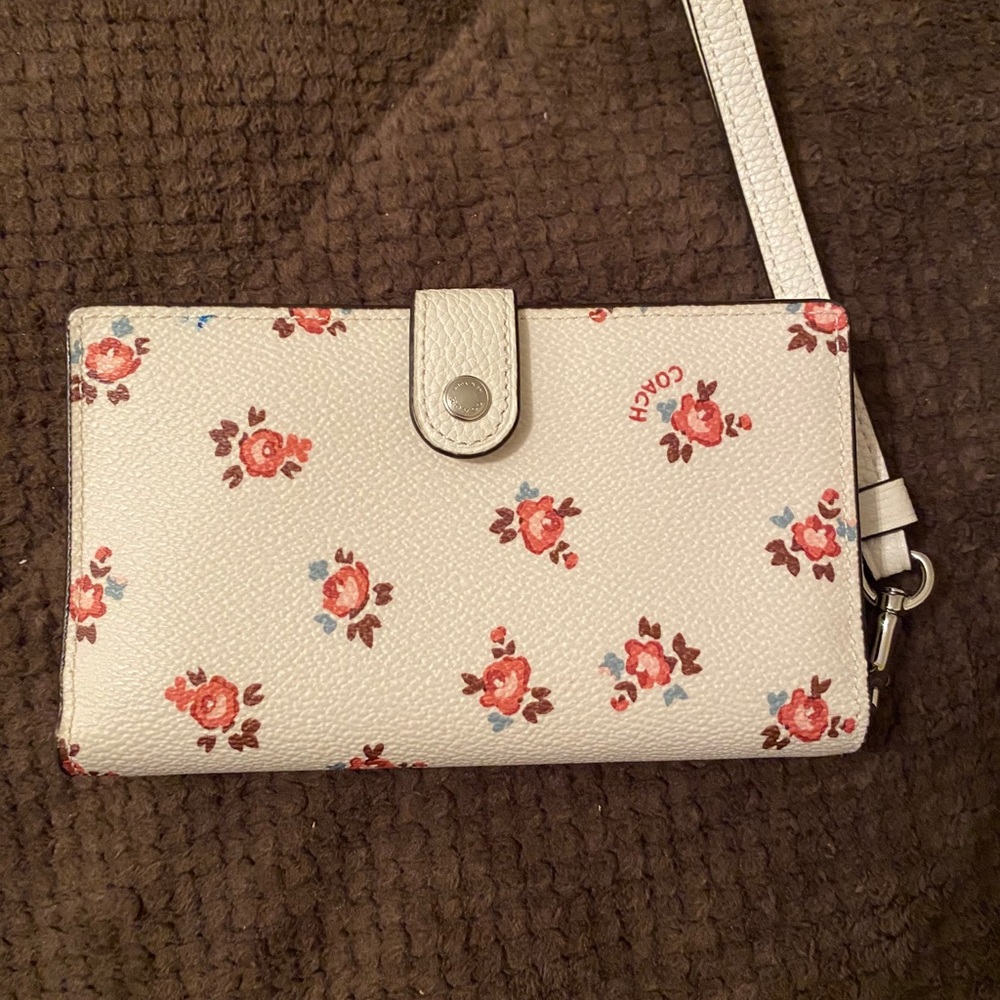 Unique and adorable Coach wristlet
